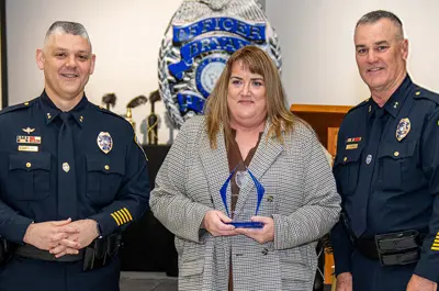 award being presented to a Bryan Police employee