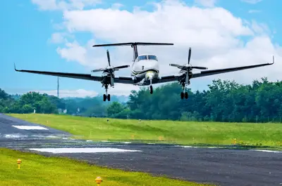 airplane landing on an airstrip