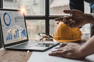 industry vendor reviewing data at work site.