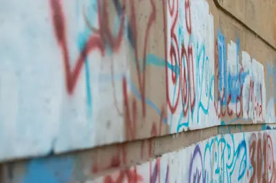 wall with graffiti painted on it