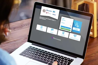 person on a laptop viewing the online bidding portal