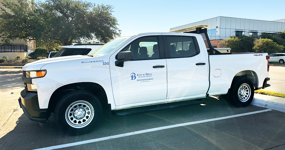 white truck with City of Bryan branding on the side.