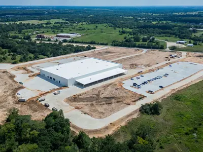 Aerial image of a facility under construction.