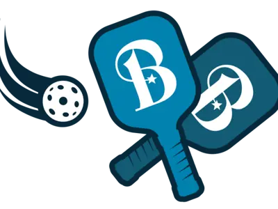 Bryan-branded pickleball paddles and ball.